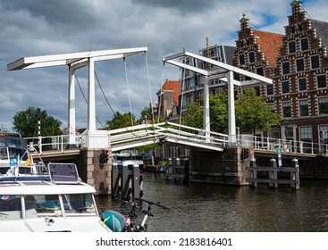 July 27 2022 The Gravesteenbrug is a pedestrian bridge over the river Spaarne in the center of Haarlem. It is a drawbridge that lifts from both banks to all boats to pass.