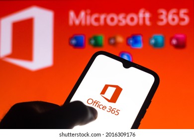 July 29, 2021, Brazil. In this photo  the Microsoft Office 365 logo is seen on a smartphone and a pc screen