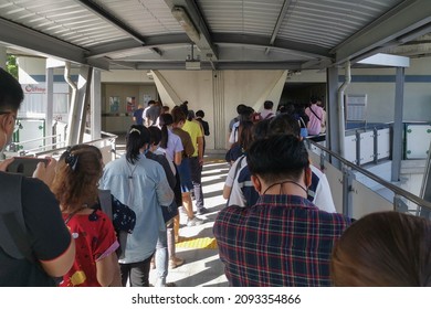 July 30, 2020, Crowd Of People Line Up On Udomsuk Bts Skytran Station During The COVID-19 Pandemic.