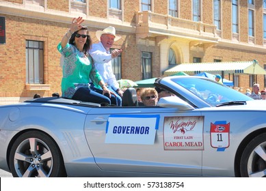 JULY 7, 2014. CASPER, WY. CIRCA: Governor Matt Mead And First Lady Carol Mead Leading The Annual Parade In Casper, Wy.