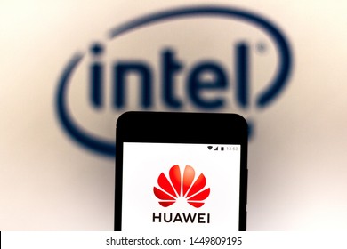 July 9, 2019, Brazil. In This Photo Illustration The Huawei Logo Is Displayed On A Smartphone. In The Background, Intel Corporation Logo.