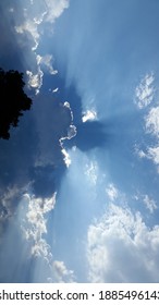 July Evening Sky In Northwest Georgia USA, With Breathtaking Shadows And Sun Rays, And A Double Take Outline.   Taken With An Android Phone Camera Around 630 Pm.