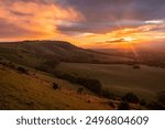 July sunset over Ditchling beacon on the south downs east Sussex south east England UK