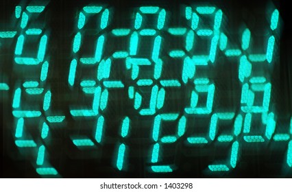 Jumbled up numeric digits on a LED display. Concept for digital processing, computing, encryption.
