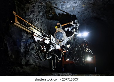 Jumbo Drill Posing at Massive Excavation Underground Mine
