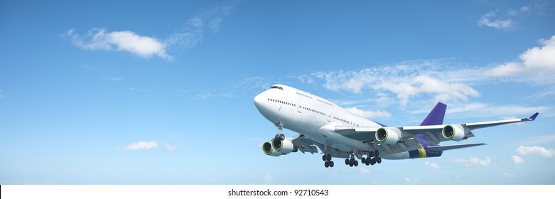 Jumbo Jet Aircraft Is Maneuvering In A Blue Sky. Panoramic Composition.