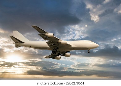 Jumbo Jet In Flight Against Twilight Sky