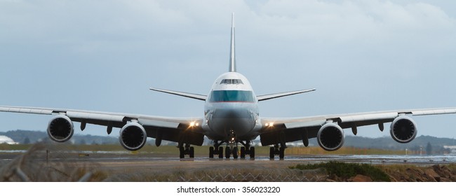 Jumbo Jet On Runway - Front View