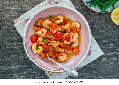 Jumbo King Prawn With Tomatoes And Garlic Garnished With Fresh Parsley- Overhead View