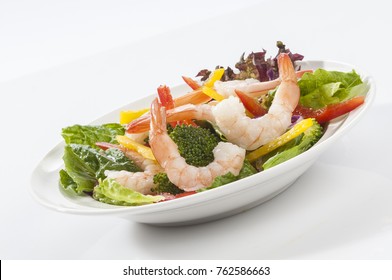 Jumbo Shrimp Salad With Broccoli & Vegetable With Coloured Bell Pepper On White Plate With White Background 