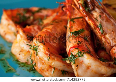 Jumbo shrimps (head on) with grilled lemon and garlic and citrus sauce
