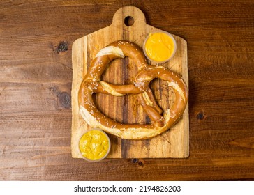 Jumbo Soft Pretzel With Mustard And Cheese.