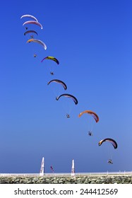 JUMEIRAH BEACH,UNITED ARAB EMIRATES-DECEMBER 2, 2013: Group Of Sky Divers Falling From The Sky In Dubai,United Arab Emirates