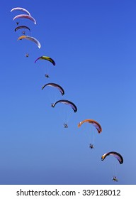 JUMEIRAH BEACH,UNITED ARAB EMIRATES-DECEMBER 2, 2013: Group Of Sky Divers Falling From The Sky In Dubai,United Arab Emirates