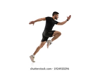 In jump. Caucasian professional sportsman training isolated on white studio background. Muscular, sportive man practicing. Copyspace. Concept of action, motion, youth, healthy lifestyle. - Powered by Shutterstock