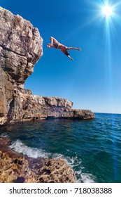 Jump From The Cliff In Croatia, On Krk Island
