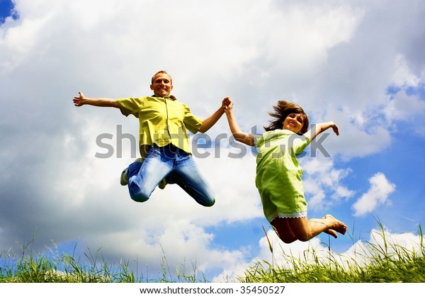 Jump Happiness People On Blue Sky Stock Photo Edit Now 35450527