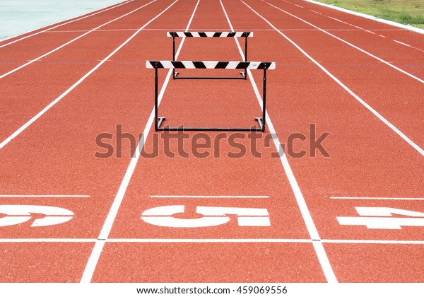 Jump hurdle on running
track