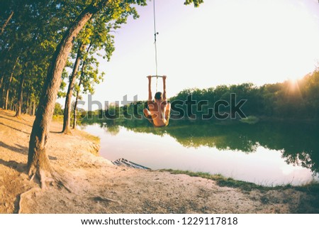 Similar – Image, Stock Photo Swimming fun at quarry pond, young adults swing into the water