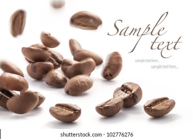 Jumping Coffee Beans, Isolated On White Background (with Sample Text)