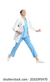 Jumping female doctor against white background