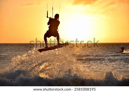 Jumping into the Sunset in Bonaire While Kitesurfing