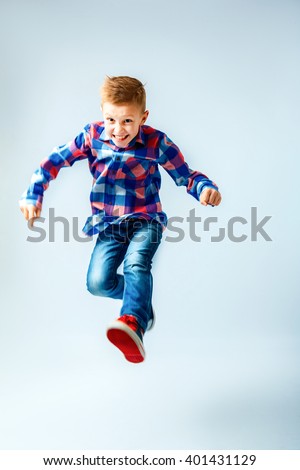 Similar – Image, Stock Photo Kid jumping on the sunny meadow outdoors