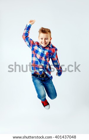 Image, Stock Photo Kid jumping on the sunny meadow outdoors