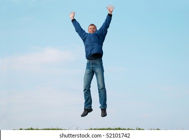 Jumping Man On Hill Green Grass Stock Photo 52101742 | Shutterstock