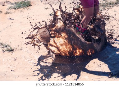 Jumping in a mud puddle
