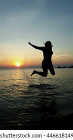 jumping on the beach.