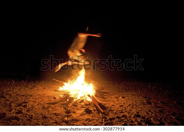 Jumping Over Fire Stock Photo 302877914 | Shutterstock