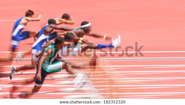 Jumping over hurdles, motion\
blur