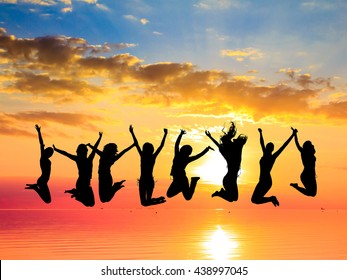 Jumping Over Sunset Friends Silhouettes Stock Photo (Edit Now) 438997045