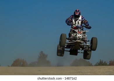 jumping with a quad during a race