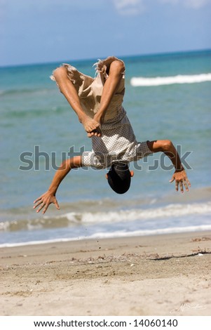 Similar – Image, Stock Photo Father and son playing superhero on the beach at the day time. People having fun outdoors. Concept of summer vacation and friendly family.