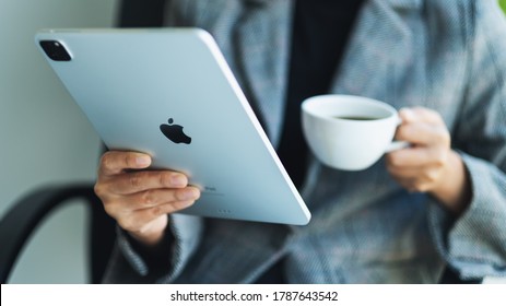 Jun 22nd 2020 : A Woman Holding And Using Apple New Ipad Pro 2020 Tablet Pc In Office , Chiang Mai Thailand