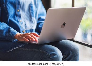 Jun 27th 2020 : A Woman Using And Working On Apple MacBook Pro Laptop Computer , Chiang Mai Thailand