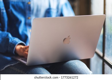 Jun 27th 2020 : A Woman Using And Working On Apple MacBook Pro Laptop Computer , Chiang Mai Thailand