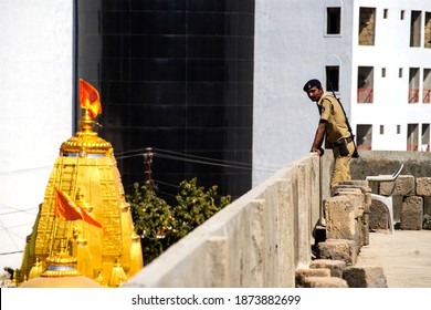 Junagadh, Gujarat, India - March 7, 2016: A Police Personnel Keep A Watch On Devotees Arriving At Bhavnath Mahadev Temple On The Occasion Of Mahashivratri Festival. 