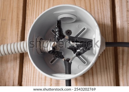 Junction box for electrical wires, twisted wires close up