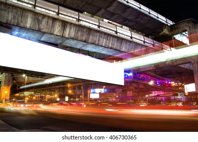 Junction At Night With Empty Billboard For Advertising