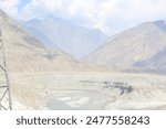 The Junction of the Three Mightiest Mountain Ranges, the Point where the Himalayas, the Karakorams and the Hindu Kush meet. At the confluemce of the Gilgit and the Indus Rivers.
