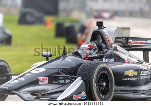 June 01,\
2019 - Detroit, Michigan, USA: ED JONES (20) of The United Emerates\
races through the turns during the  race for the Detroit Grand Prix\
at Belle Isle in Detroit,\
Michigan.