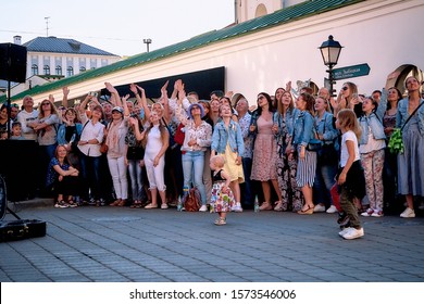 June 1, 2019 Festivities In The City On The Day Of Swedish Culture Cheerful People Look Up At A Street Concert