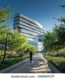 June 12, 2020: Person Walks Towards UC San Diego Jacobs Medical Center Building And Parking Lot