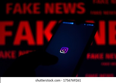 June 15, 2020, Brazil. In This Photo Illustration The Instagram Logo Is Displayed On A Smartphone And Red Alerting Word FAKE NEWS On The Blurred Background.