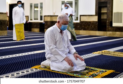 JUNE 15,2020-DOHA,QATAR:The faithful praying with face masks at a mosque in Doha,Qatar. Mosques reopened to worshippers after weeks of closure as a preventive measures against the COVID-19) pandemic
