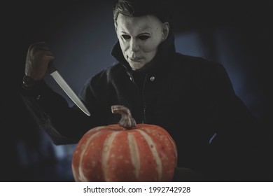 JUNE 17 2021: Halloween slasher Michael Myers carving a pumpkin - Trick or Treat Studios Action Figure