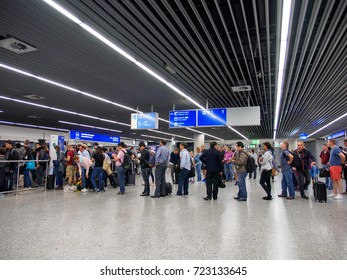 June 18, 2017. Wide Angle View Of Travelers Standing In Long Lines At The Border Control Of Frankfurt International Airport, Germany. Travel And Security Editorial Concept.